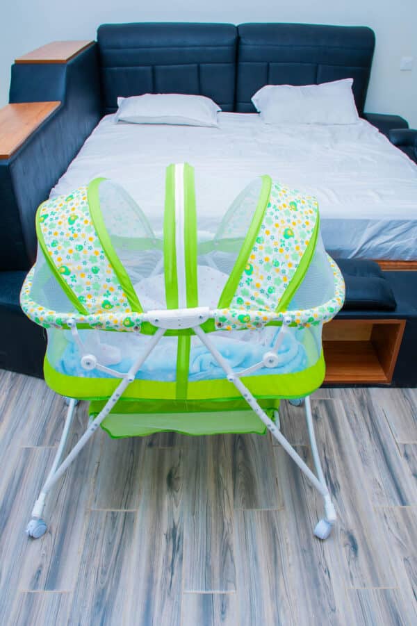 Foldable Baby Bassinet with Net and Wheels - Image 16