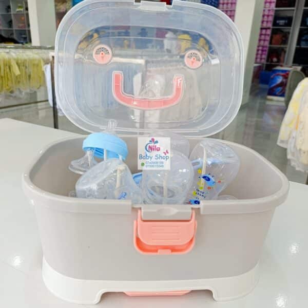 Compact Baby Bottle Drying Rack with Secure Closure and Storage Tray