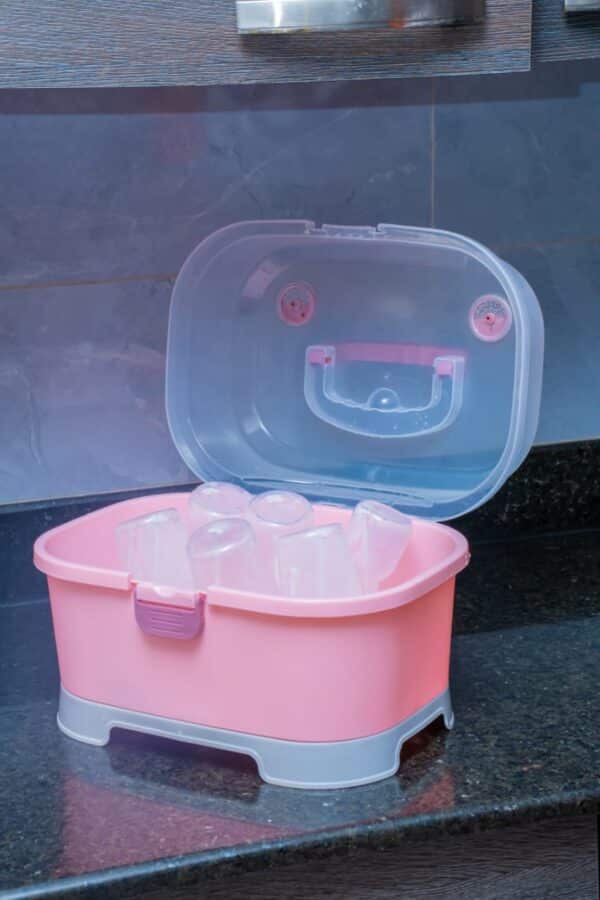 Compact Baby Bottle Drying Rack with Secure Closure and Storage Tray