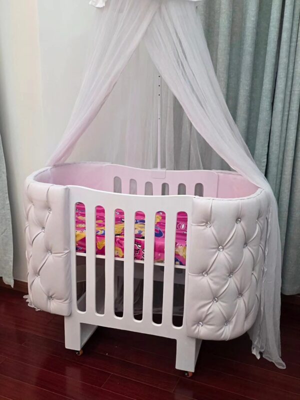 Elegant Designer Baby Cot with Satin-Cushioned Panels and Canopy Drape