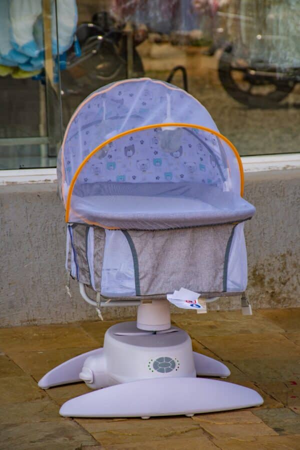 Baby Bassinet Cradle with Mosquito Net & Toys - Image 6