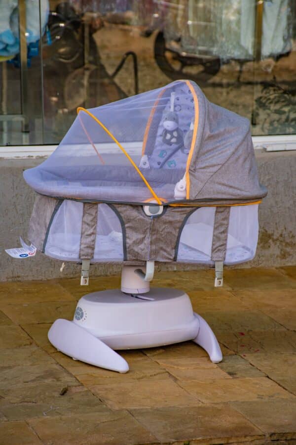 Baby Bassinet Cradle with Mosquito Net & Toys - Image 4