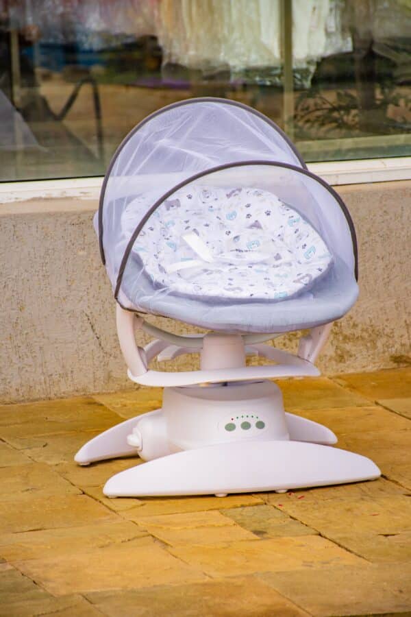 Electric Baby Swing Rocker with Music, Toy Bar & Mosquito Net - Image 13