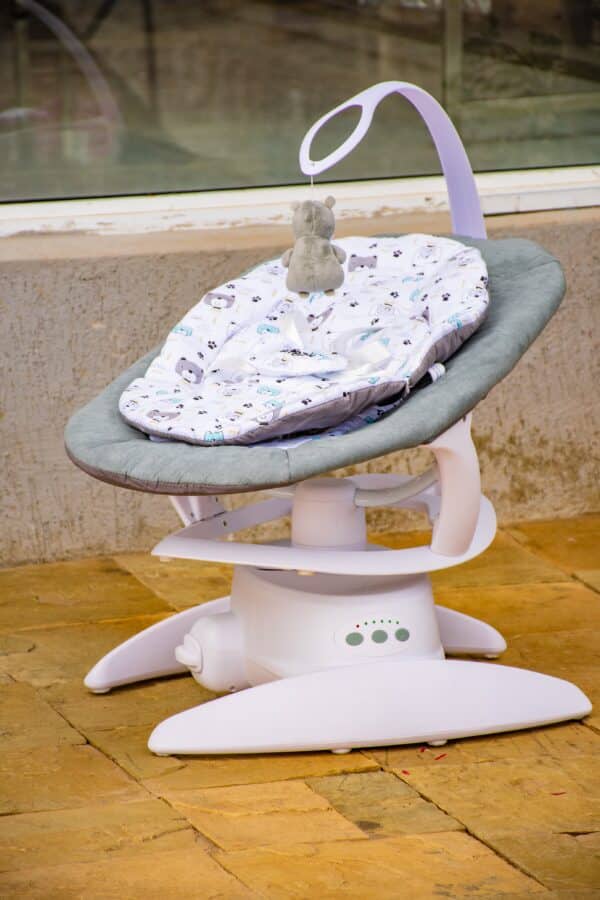 Electric Baby Swing Rocker with Music, Toy Bar & Mosquito Net - Image 10