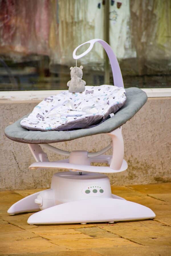 Electric Baby Swing Rocker with Music, Toy Bar & Mosquito Net - Image 11