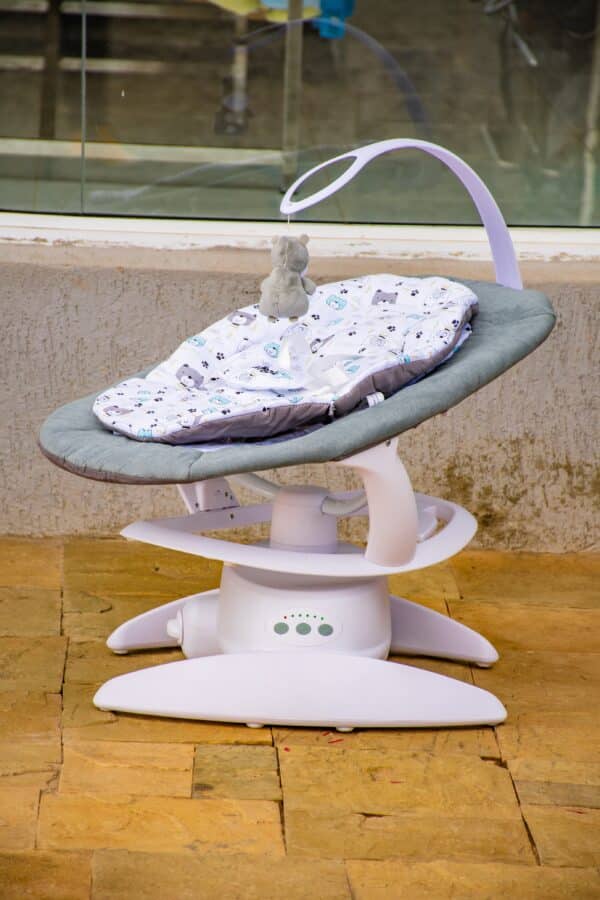 Electric Baby Swing Rocker with Music, Toy Bar & Mosquito Net - Image 9