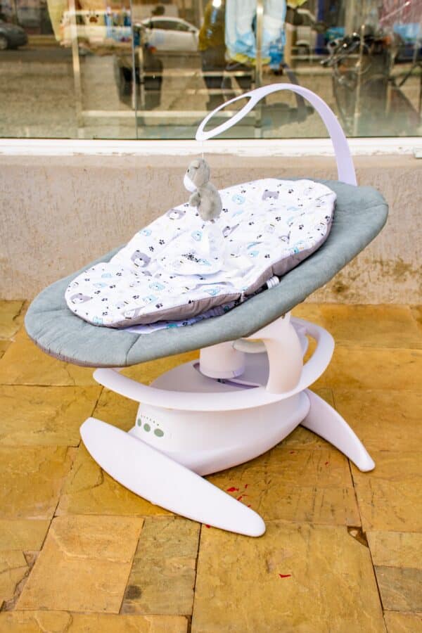 Electric Baby Swing Rocker with Music, Toy Bar & Mosquito Net - Image 5