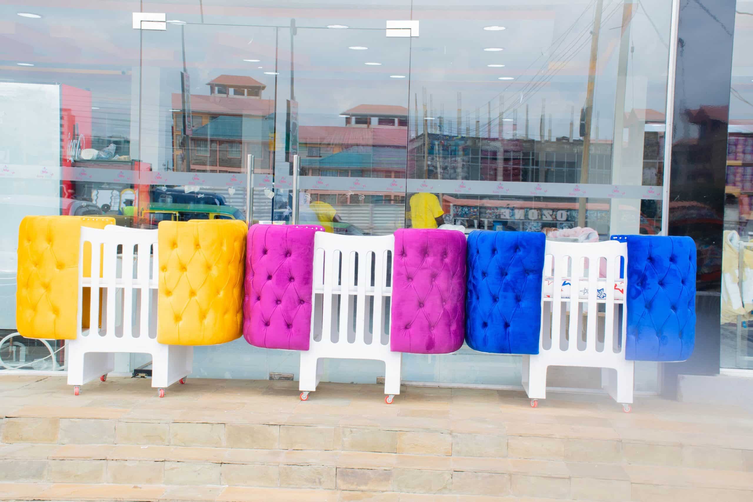 Elegant Designer Baby Cot with Satin-Cushioned Panels and Canopy Drape